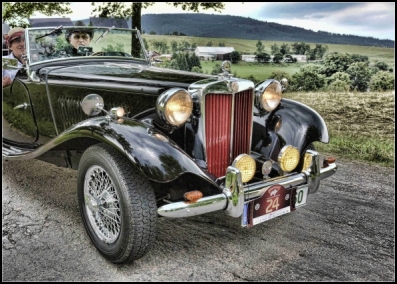 MG
